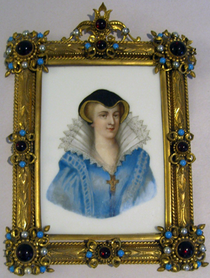 An 18th-century portrait of Mary Queen of Scots is painted on porcelain and presented in its original brass and jeweled frame with simulated pearls, turquoise and garnets. The 4-inch by 5 1/2-inch painting has a $400-$800 estimate. Image courtesy of Professional Appraisers and Liquidators LLC Antique Auctions.